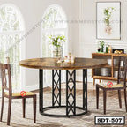 Round steel dining table with wooden top, two chairs, in a modern dining room setting