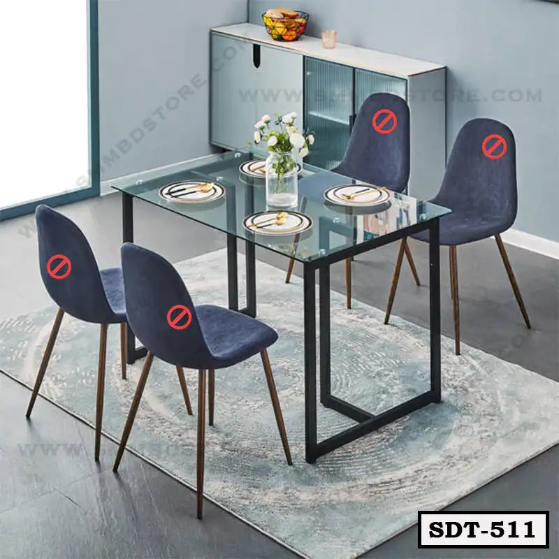 Modern steel dining table with glass top and four blue chairs in a contemporary dining room
