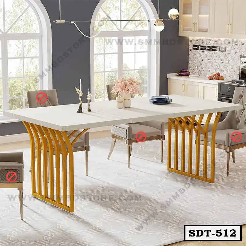 Modern steel dining table with gold legs and cream top in a stylish dining room Main image