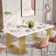 Modern steel dining table with white tabletop, gold legs, six upholstered chairs, and elegant table setting in a contemporary dining room.