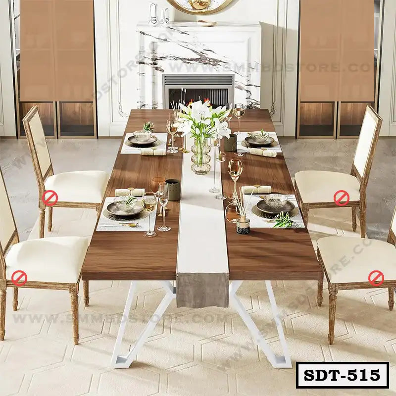 Modern steel dining table with wooden top, white metal legs, and six upholstered chairs in a dining room setting.