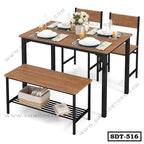 Modern steel dining table set with wood finish, three chairs, bench, and place settings