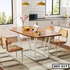 Modern steel dining table with wooden top and four chairs in a contemporary kitchen setting