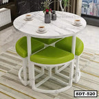 Round white marble dining table with green cushioned stools in modern living room