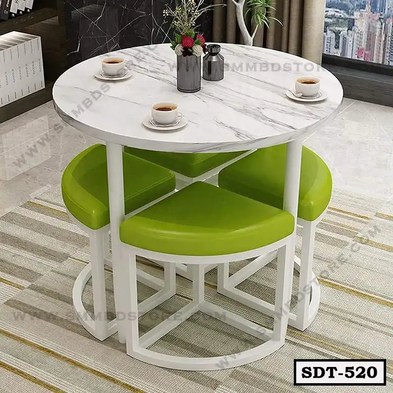 Round white marble dining table with green cushioned stools in modern living room