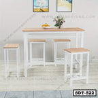 Modern steel dining table set with four stools, wood top, white metal frame, home interior