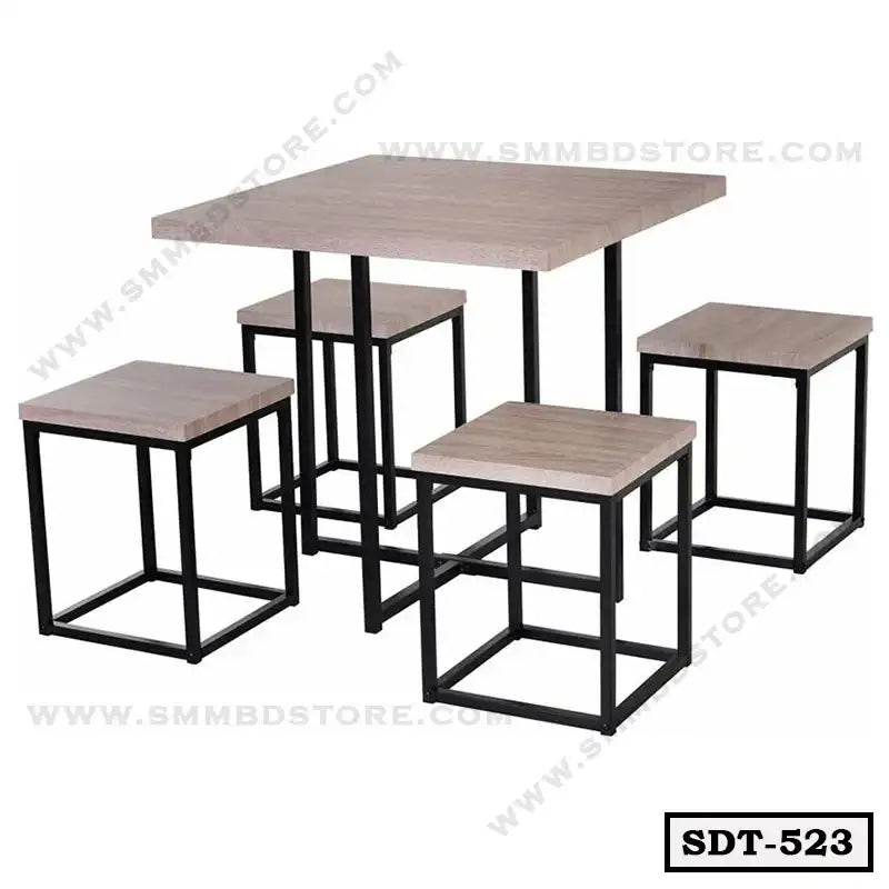 Modern steel dining table with four matching square stools and minimalist black metal frames