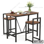 Modern steel dining table set with two chairs, wooden top, and minimalist design.