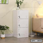 Steel file cabinet with three lockable compartments in a modern home office setting