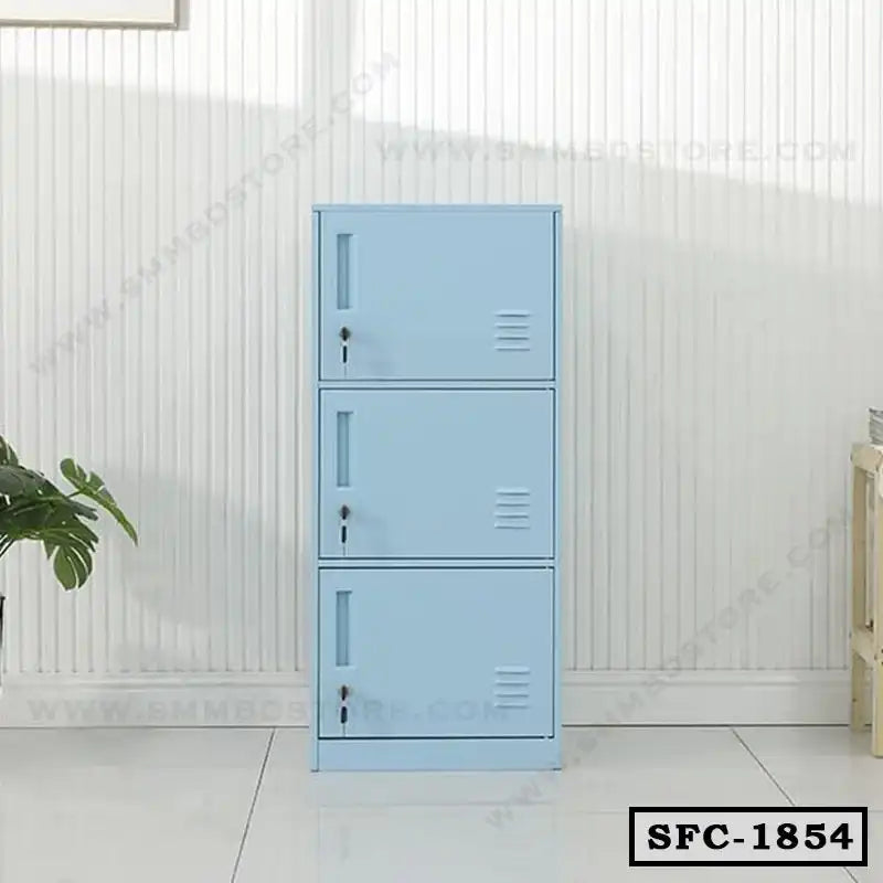 Light blue steel file cabinet with three lockable doors in a modern office setting