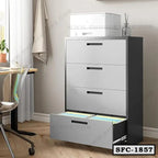 Modern steel file cabinet with four drawers in a home office, bottom drawer open with files.