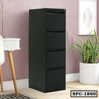 Black steel file cabinet with four drawers in a modern office setting, next to a plant and desk.