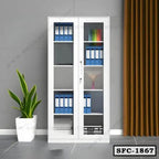 Steel file cabinet with glass doors, office folders, potted plant, and curtain in modern office