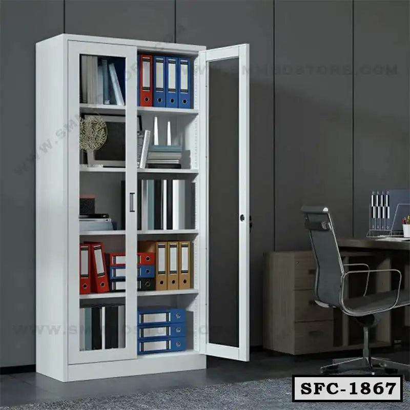 Steel file cabinet with glass doors, filled with office folders, beside modern desk and chair