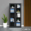 Steel file cabinet with glass doors, shelves of office folders, potted plants, modern room
