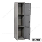Gray steel locker cabinet with three compartments and lockable doors for office storage