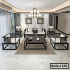 Modern steel frame sofa set with beige cushions in a stylish living room interior