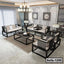 Modern steel frame sofa set with cream cushions in a stylish living room, coffee table centerpiece