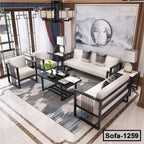 Modern steel frame living room sofa set with light cushions, coffee table, and decorative rug
