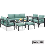 Modern steel frame sofa set with teal cushions, coffee table, and stools, ideal for living room.