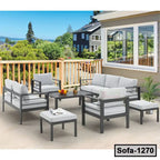 Modern outdoor patio set with steel frame sofas, cushioned seats, and coffee table on terrace