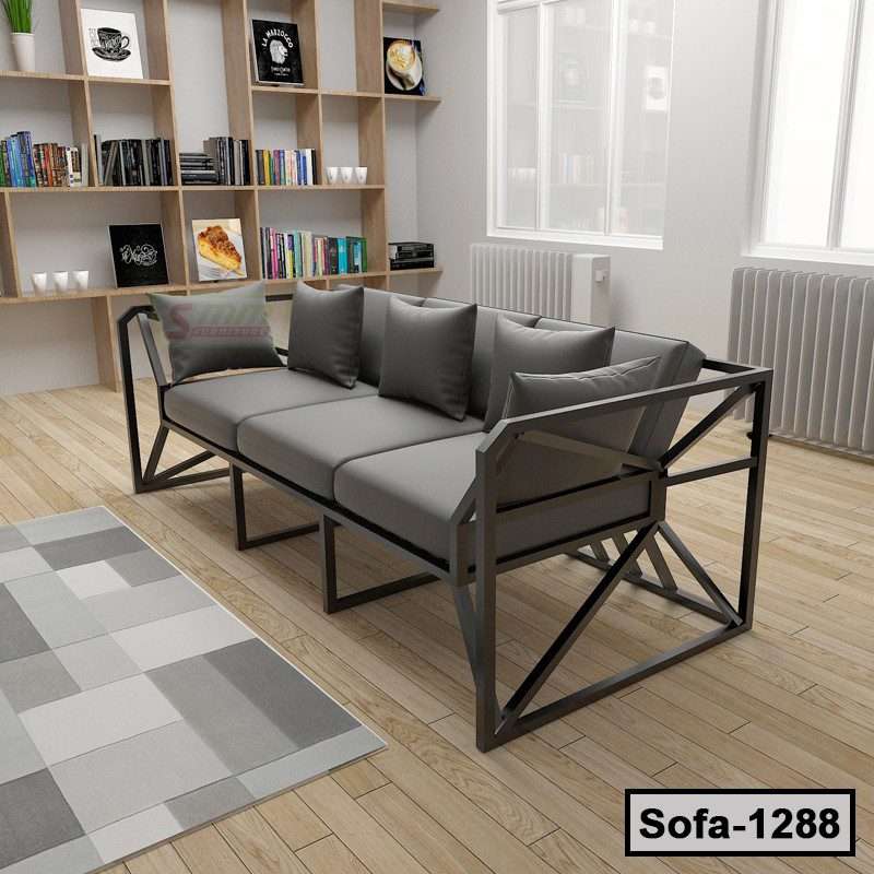 Modern steel frame sofa with gray cushions in a stylish living room setting