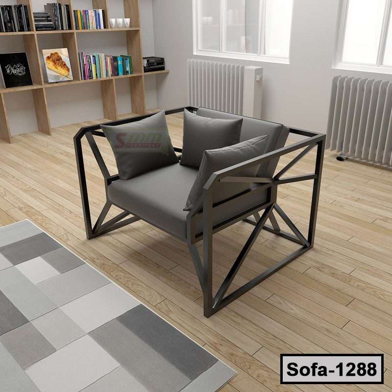Modern steel frame sofa with gray cushions in a contemporary living room with wooden floors.