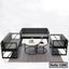 Modern steel-frame sofa set with grey cushions and two round coffee tables on a rug