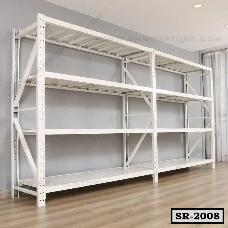 Large white metal storage rack with four shelves, placed against a wall on wooden flooring Main image