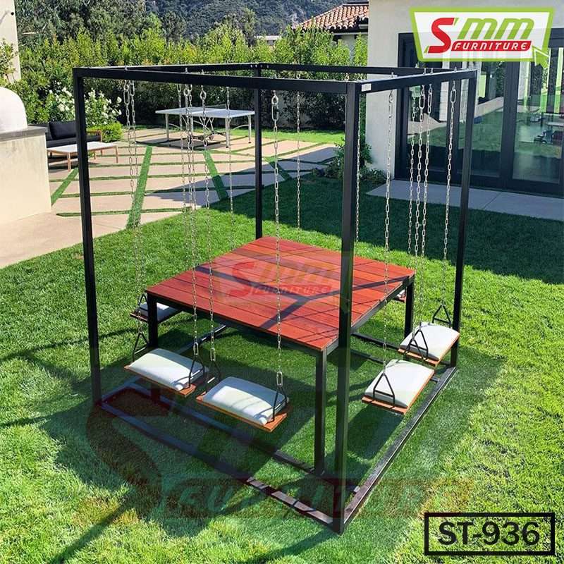 Outdoor swing table set with four hanging swing seats and metal frame on a grassy lawn. Main image