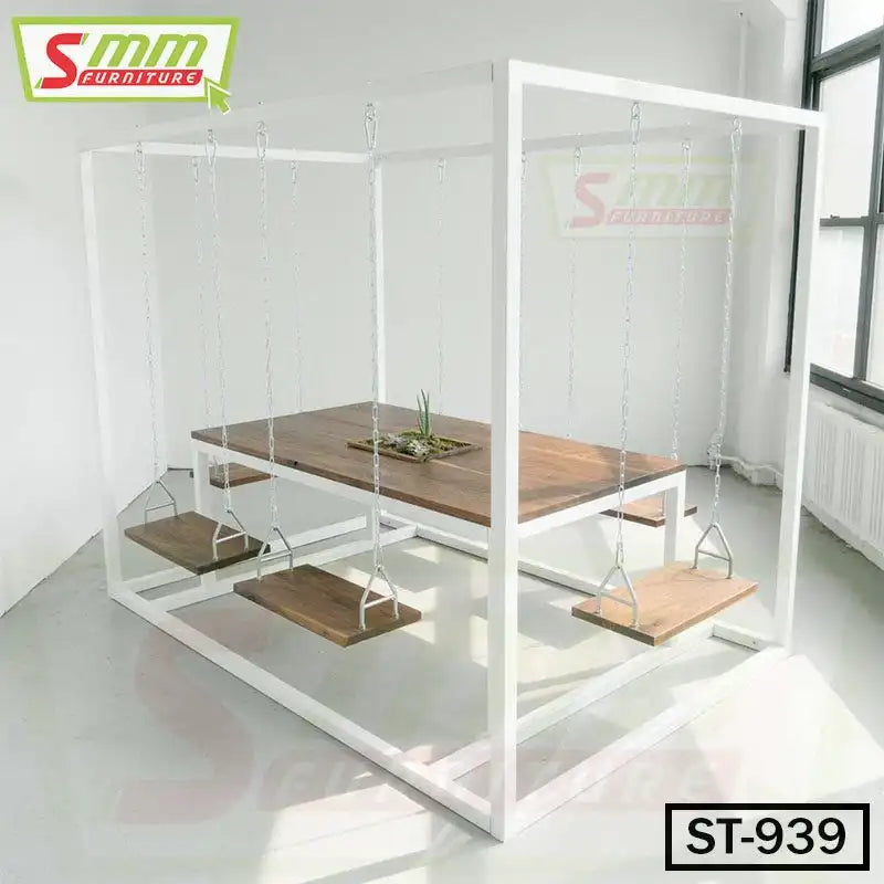 Modern swing table set with wooden seats and metal frame in bright room Main image