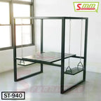 Indoor swing table set with metal frame, two swing seats, and bench near bright window