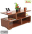 Modern wooden tea table with storage shelves, books, mugs, remote holder, and flower pot