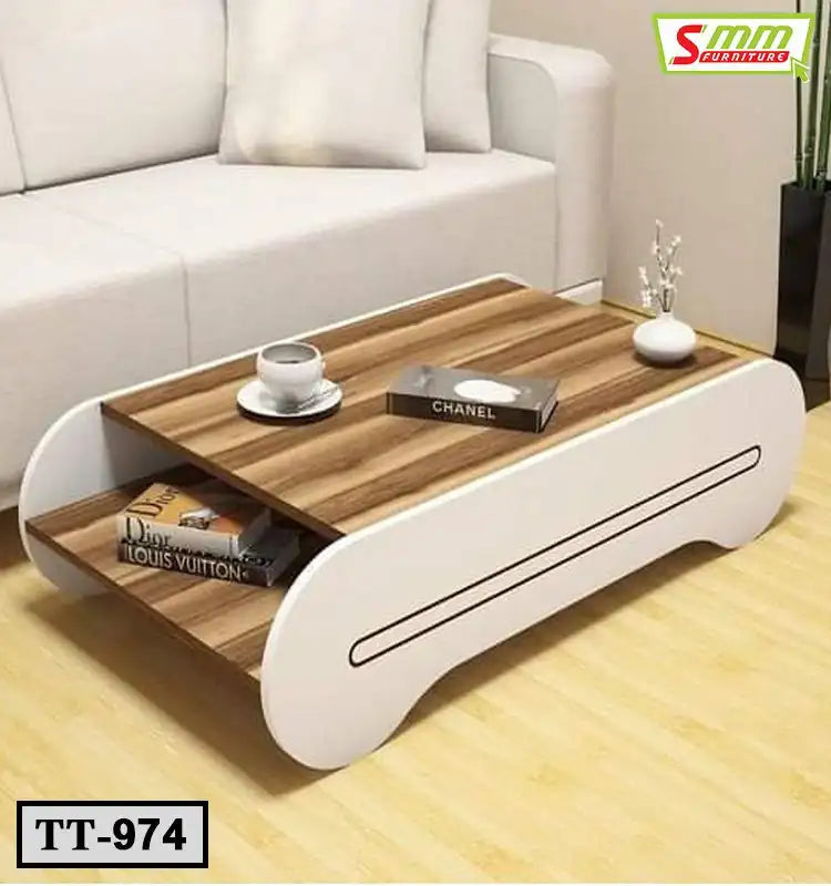 Modern wooden tea table with white sides, open shelf, books, and decor in a living room Main image
