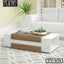 Modern white and wood tea table in a stylish living room with white sofa and decor