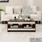 Modern wooden tea table with shelf in living room, styled with books, mugs, and decor.