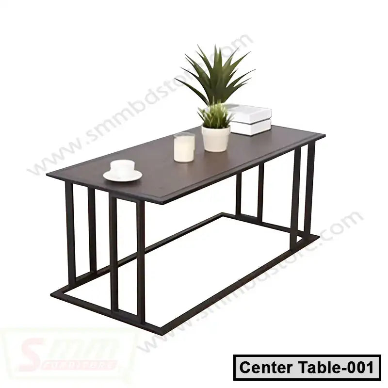 Modern rectangular tea table with black metal frame, dark wood top, and minimalist decor.