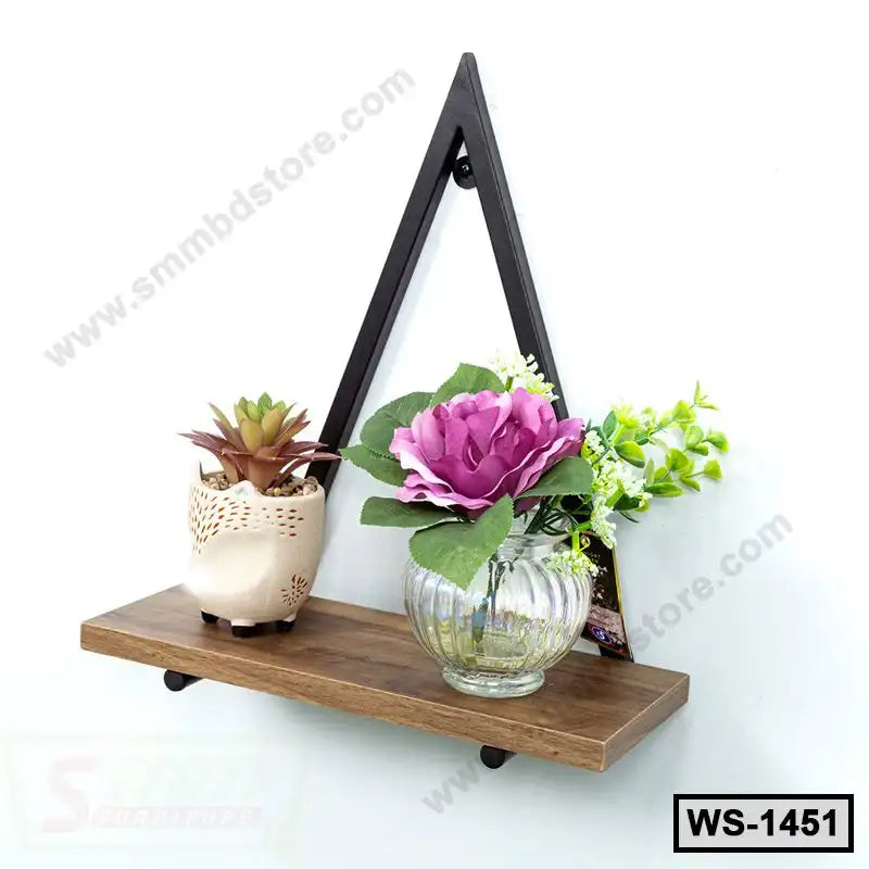 Modern wall shelf with wooden base and black metal frame, holding potted plant and flower vase