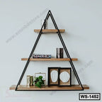 Modern triangular wall shelf with wooden tiers, metal frame, decor items, and plant.