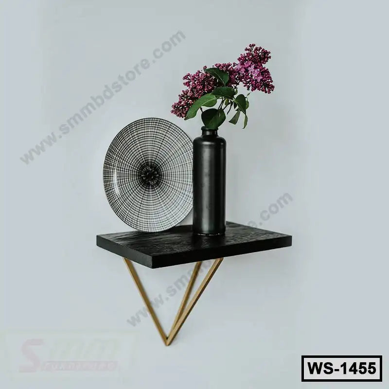 Modern wall shelf with black metal vase and geometric plate, home decor accent. Main image