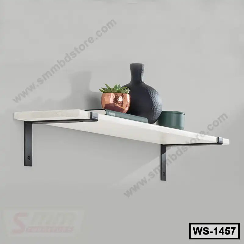Modern wall shelf with metal brackets, decorative vase, plant, and books on a grey wall. Main image