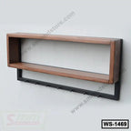 Modern wooden wall shelf with black hooks, perfect for home or office storage