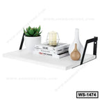 Modern wall shelf with white surface, metal brackets, potted plant, books, candle, and vases