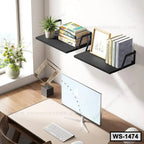 Modern black wall shelves with books and plants above a minimalist computer desk