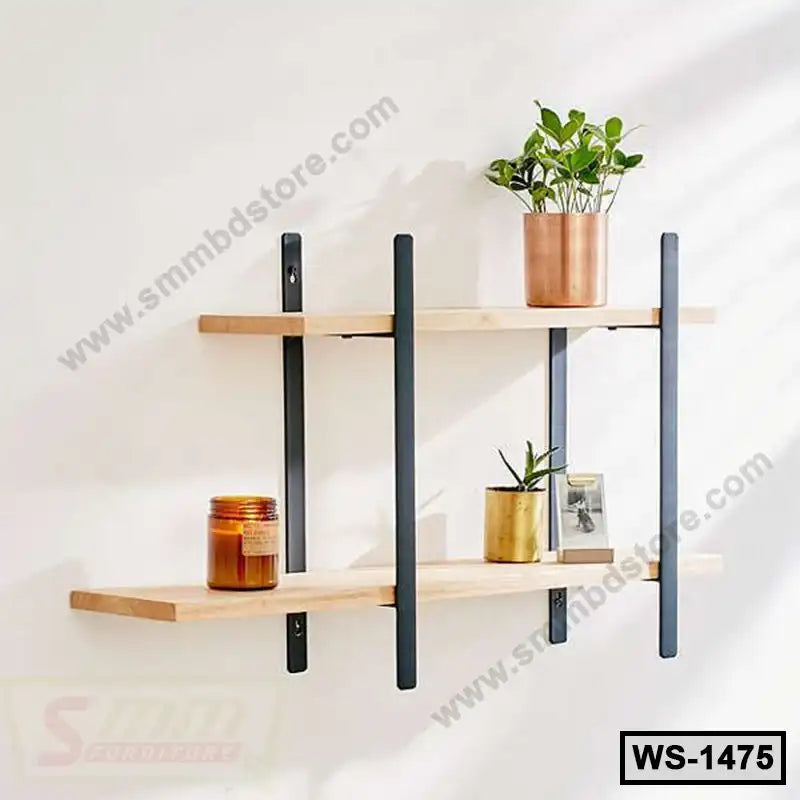 Modern wooden wall shelf with black metal brackets, decorated with plants and candle, ideal for home or office.