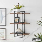 Modern wall-mounted shelf with black metal frame, wood shelves, decorative items and books.