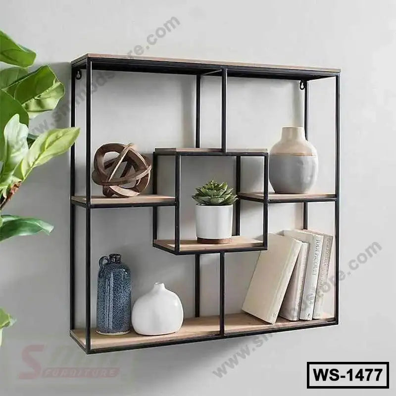 Modern geometric wall shelf with wood and metal, styled with decor, books, and a plant Main image