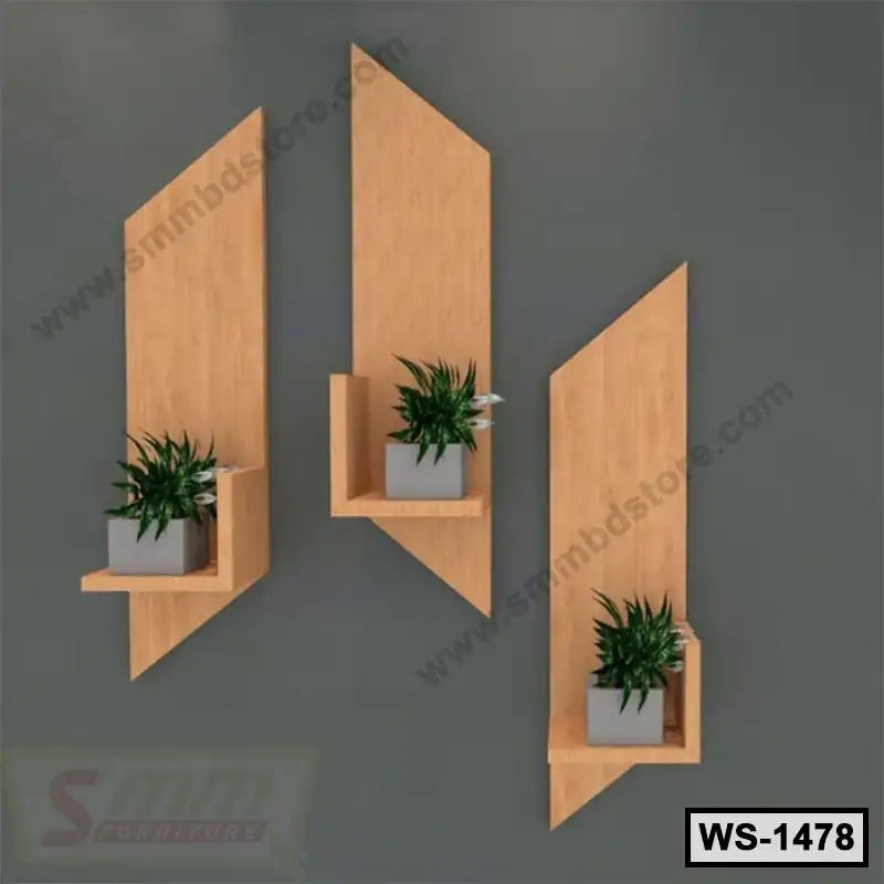 Modern wooden wall shelves set with potted plants on dark gray wall, stylish home decor
