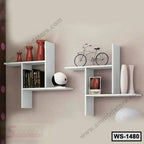 Modern white wall shelves with books, decorative vases, and a miniature bicycle, ideal for living room décor.