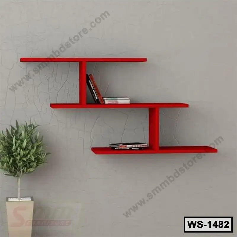 Modern red wall shelf with books on a gray wall, minimalist home decor, indoor plant Main image